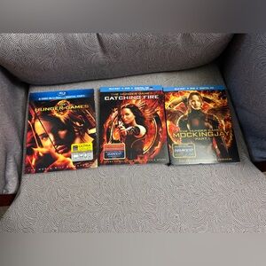 Hunger Games, Catching Fire, and Mocking Jay Part I Blu Ray NWT